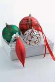 Set of Christmas baubles in open box