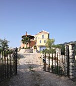 Entrance gate to Villa Octavius on island of Lefkas, Greece