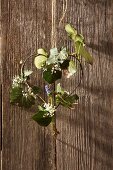Decorative heart made of ivy, baby's breath and grape hyacinth