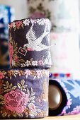 Ribbons with carrier pigeon and roses motif in various colour schemes