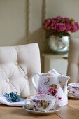 Floral tea set, linen napkin and beaded napkin ring
