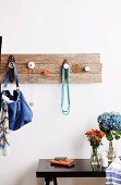 Wall coat rack with hooks made from door pulls