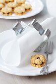 Teapot-shaped pastry cutter used as napkin ring