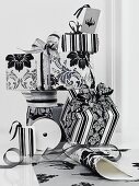 Presents packed in black and white and ribbon