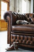 Heavy leather couch with quilted backrest