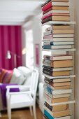 Narrow bookshelf for vertically stacked books