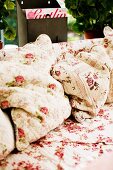 Nostalgic floral bedspread and matching cushions