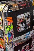 60s fridge covered in stickers