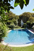 Oval pool in elegant garden