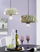 DIY, vintage lampshades upcycled from old bundt cake moulds above dining table