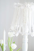 White table lamp with DIY lampshade and white tulips