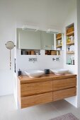 Modern wooden washstand with twin basins and wall-mounted taps