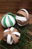 Hand-crafted baubles made from strips of paper