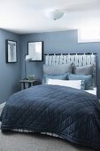 Elegant bedroom in shades of blue with vintage-style traditional ambiance