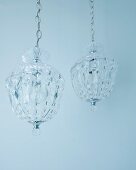 Crystal chandeliers hanging from chains