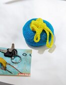 A homemade, fold-way crocheted shopping bag