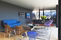 Designer furniture in modern living room in shades of blue