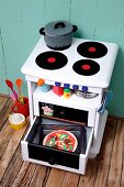 Hand-made play cooker made from old bedside table