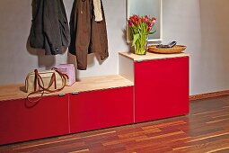 Red shoe cabinet in cloakroom