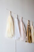 Tassels of different colours hung on wall