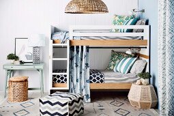 Various patterns on cube and carpet in front of bunk beds with bed ladder