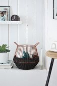 Hand-crafted wire basket wrapped in dark brown sisal cord