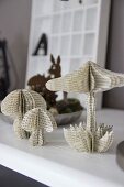 Toadstool ornaments made from old book pages
