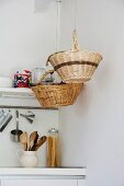 Baskets hung above kitchen counter