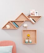 Homemade tangram-style wall shelves