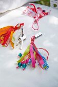Homemade tassels made of colourful ribbons as a pendant for keys or memory sticks