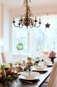 Table festively set with Christmas decorations