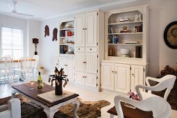 Large cupboard in country-house-style living-dining room