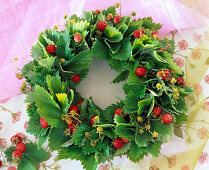 Wreath made of monthly strawberries