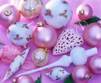 Christmas tree decorations, pink and white balls, pink porcelain heart, white lace