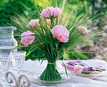 Bunch of stems with barley and peonies
