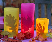 Lanterns with foliage and colorful parchment paper
