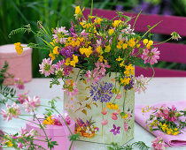 Put meadow bouquet in gift bag