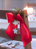Red bow with cinnamon stars and Pseudotsuga tip