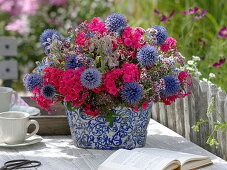 Blue-pink bouquet of perennials and herbs