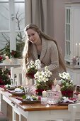 Christmas table decoration with Helleborus niger (Christmas rose)