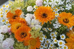 Orange-white bouquet with marigolds