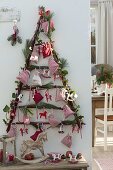 Stylized Christmas tree from dogwood branches as Advent calendar