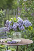 Lilac bouquet in glass vase