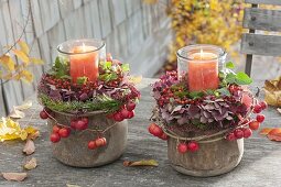 Preserving jars as lanterns with wreaths of Hydrangea