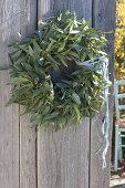 Wreath made from cutback of Eucalyptus on old wooden door