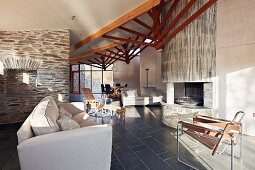 Living room with stone walls in modern house