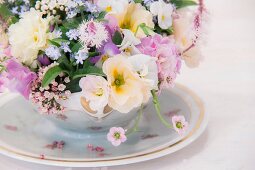 Festive flower arrangement of delicate spring flowers