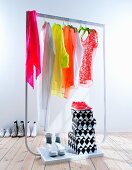 Neon clothes on clothes rack