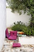 Floor cushions and picnic on terrace