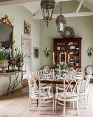 Festively set table in dining room in natural shades